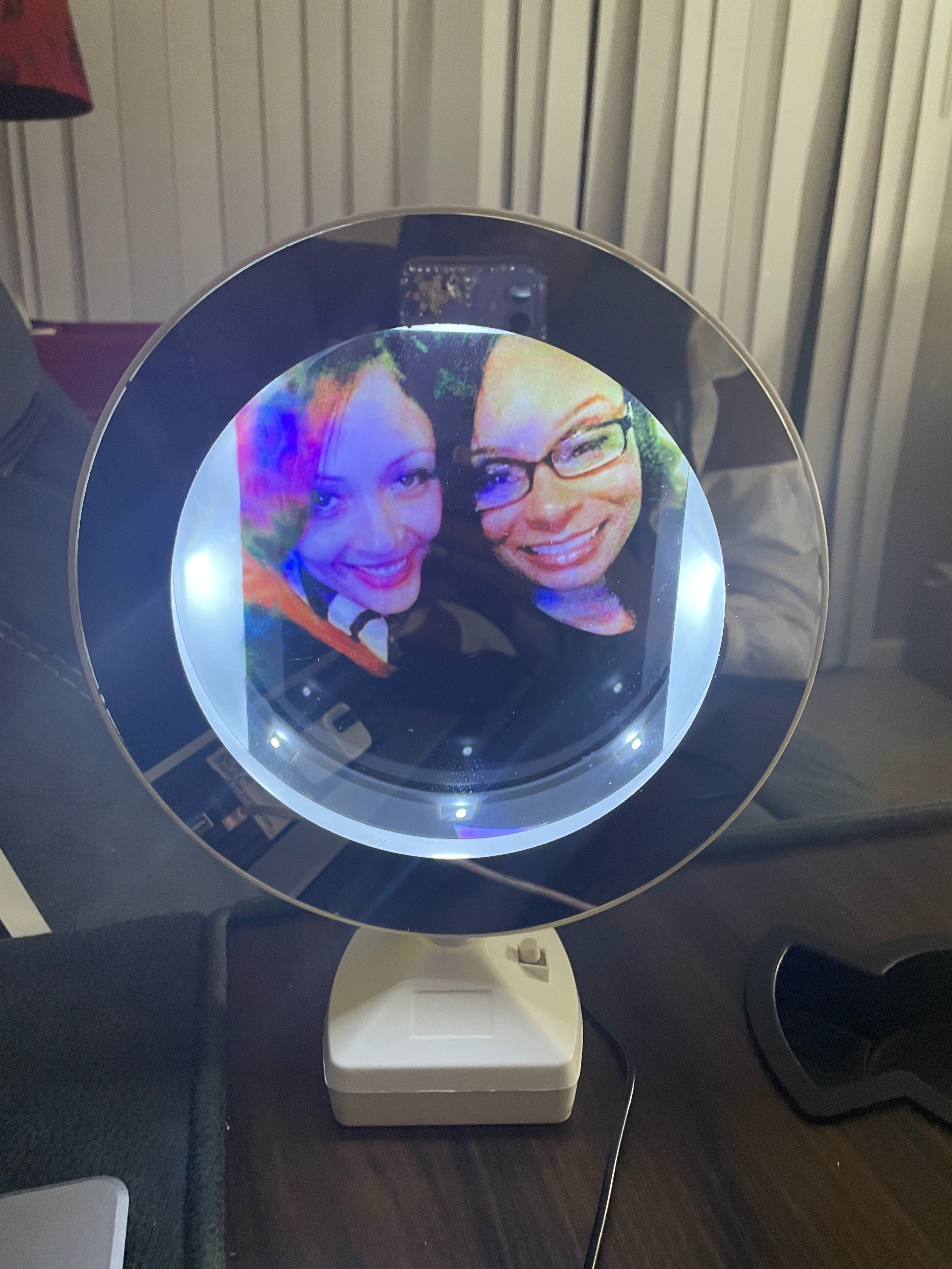 This item  is best known as the magic mirror … it is a cute mirror untill you turn on the switch and a lovely photo appears this item has light as well so this would be an awesome gift for anyone.